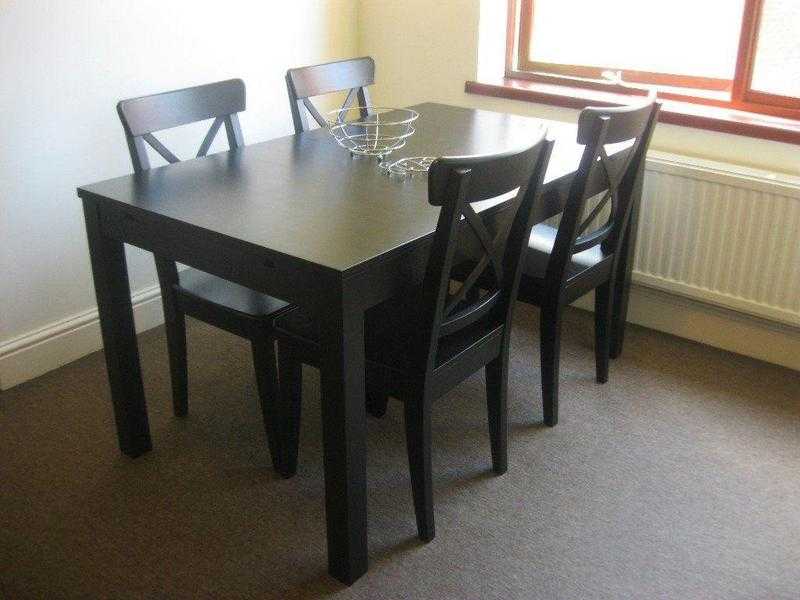 Ikea Bjursta dining table and 4 chairs