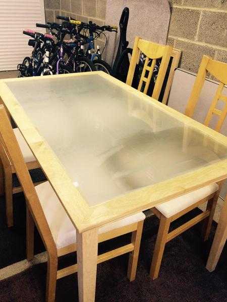 IKEA frosted glass dining table with 4 chairs