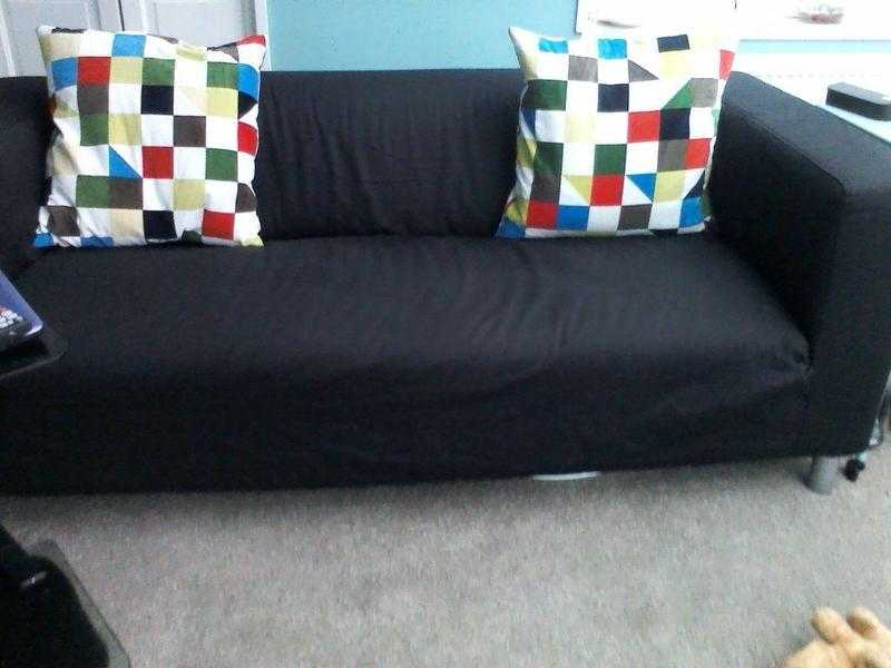 IKEA SOFA NEARLY NEW WITH A BLACK COVER