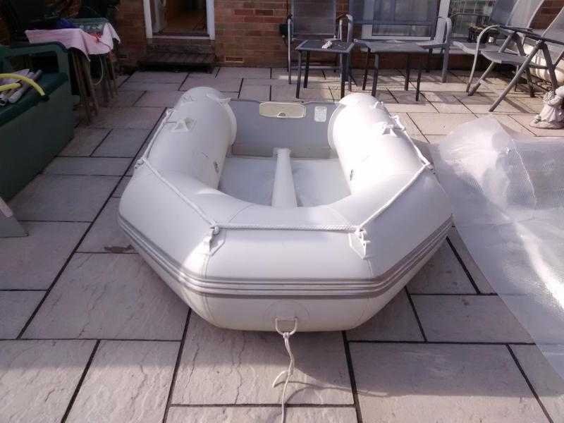 INFLATABLE DINGHY 2.7 METERS , INFLATABLE KEEL AND WOOD FLOOR , WILL TAKE OUTBOARD