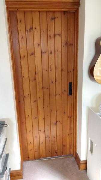 Internal wooden panel cottage door with hinges and latch