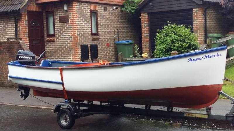 IP16 open fishing boat on trailer