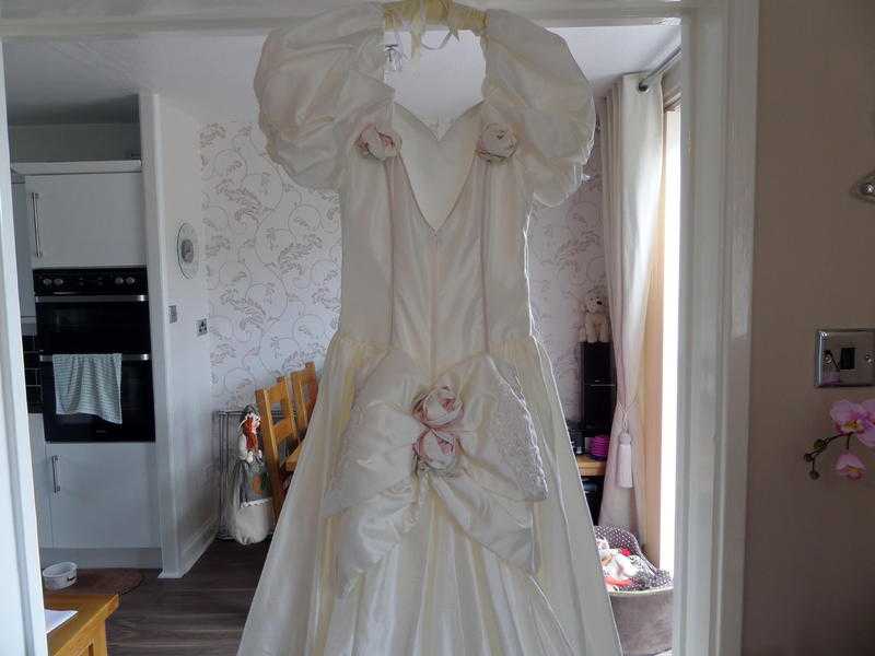 Ivory silk wedding dress.