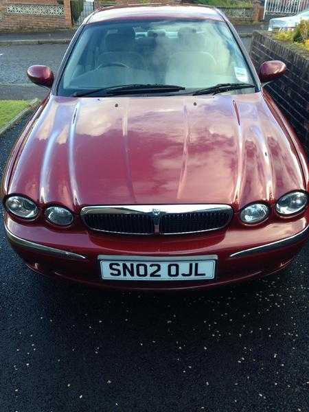 jaguar x type 2.5 V 6 4 door auto petrol Red