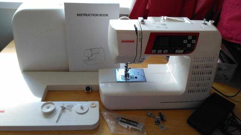 Janome QXL605 Sewing Machine