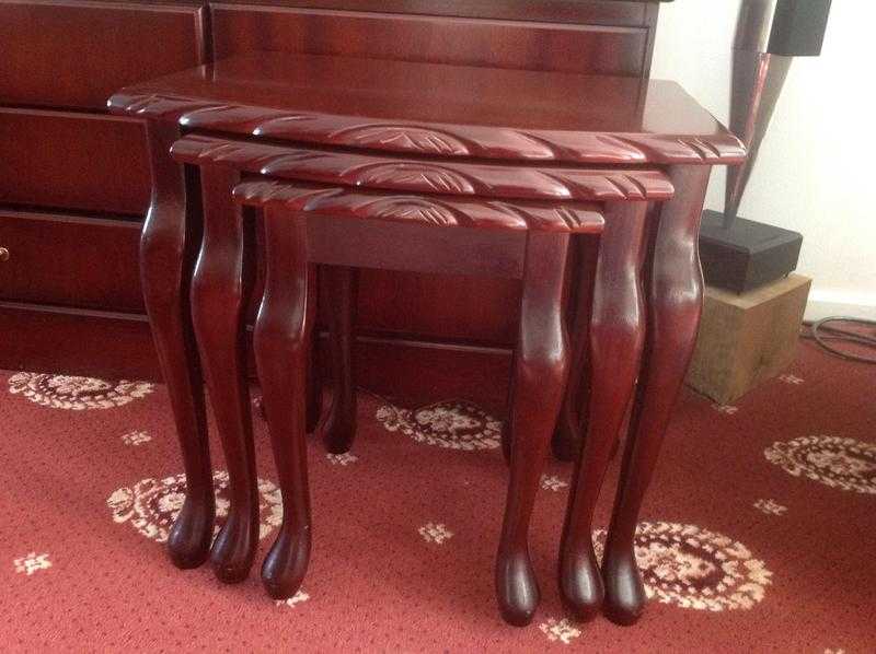 John. E Coyle mahogany nest of tables