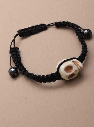 JTY106 - Black corded adjustable bracelet with skull bead.