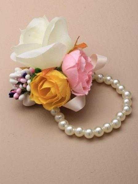 JTY127C - Faux pearl bead stretch wrist corsage with large roses with coloured buds. Cream
