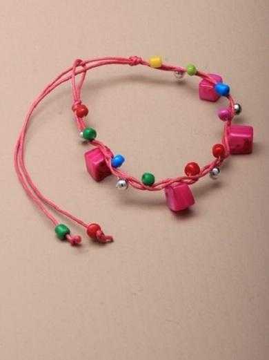 JTY130 - Brightly coloured square shell and beaded cord bracelet.