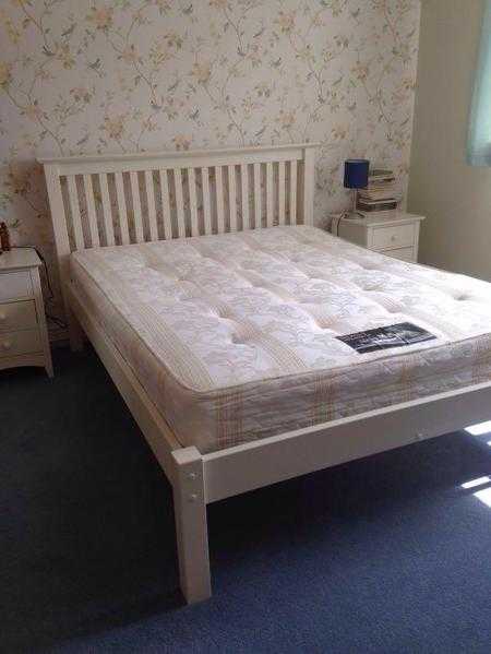 King bed with matress with two bedside table and two drawer dresser