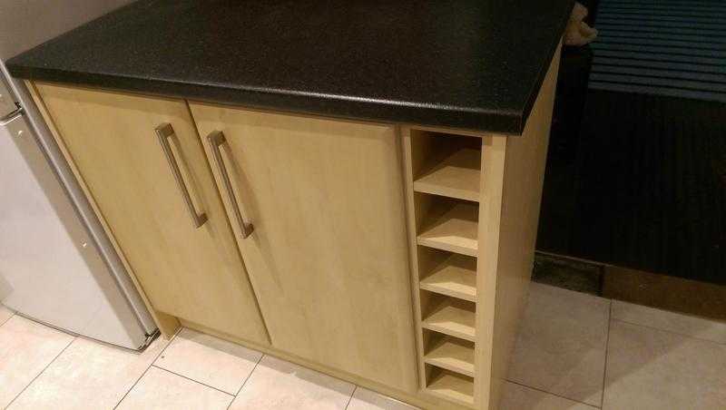 Kitchen cupboard with built in wine rack complete with worktop