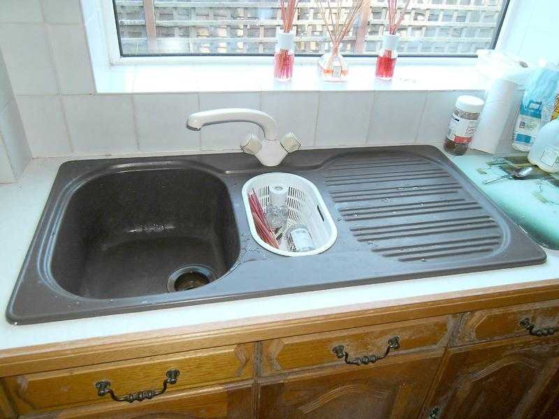 Kitchen sink and taps