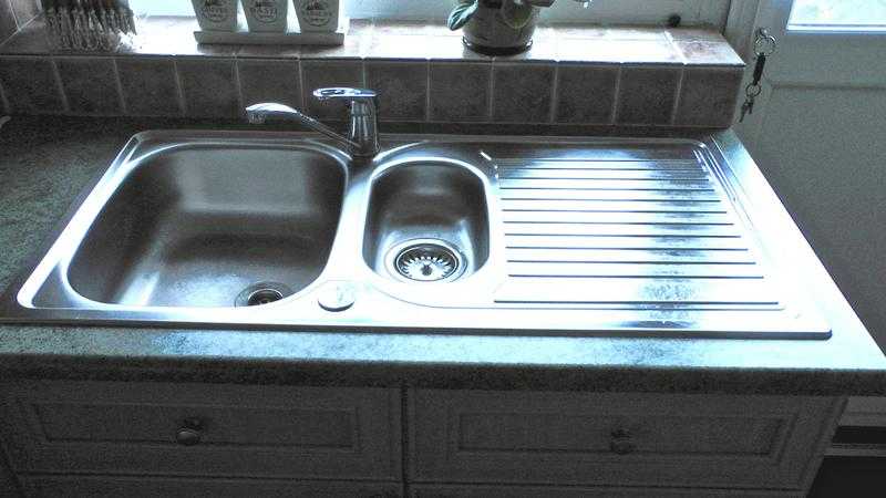 Kitchen sink and taps