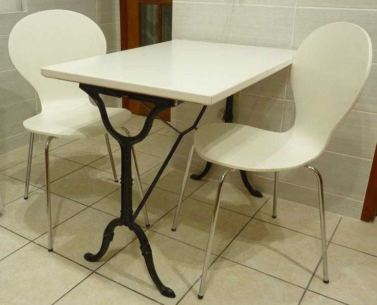 Kitchen Table and two nearly new chairs.