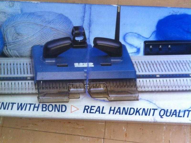 Knitting machine. Boxed. Bargain  Instructions etc are enclosed. Bond Elite.