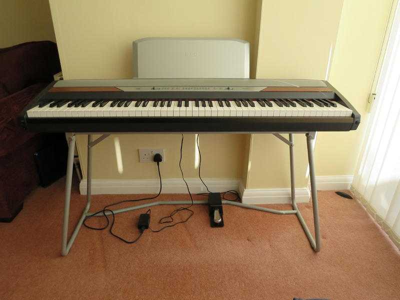Korg SP250 digital piano complete with piano stool