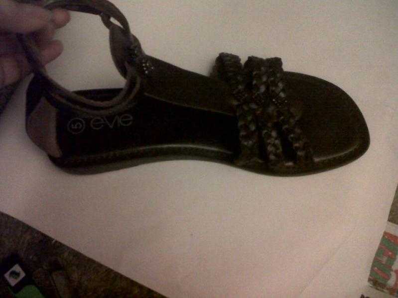 Ladies brown plaited leather gladiator sandals.