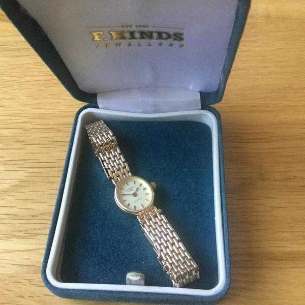 LADIES ROTORY SOLID 9ct GOLD WATCH WITH 9ct SOLID GOLD BRACELET