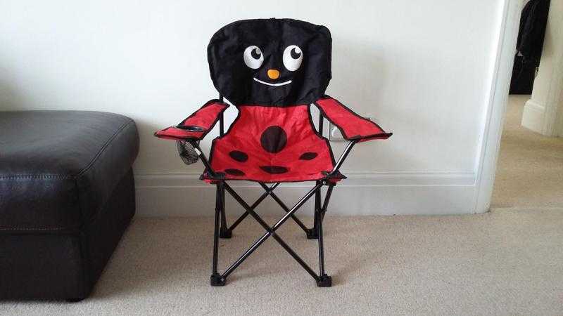 Ladybird childrens gardencamping fold up chair in a bag.  Great condition.