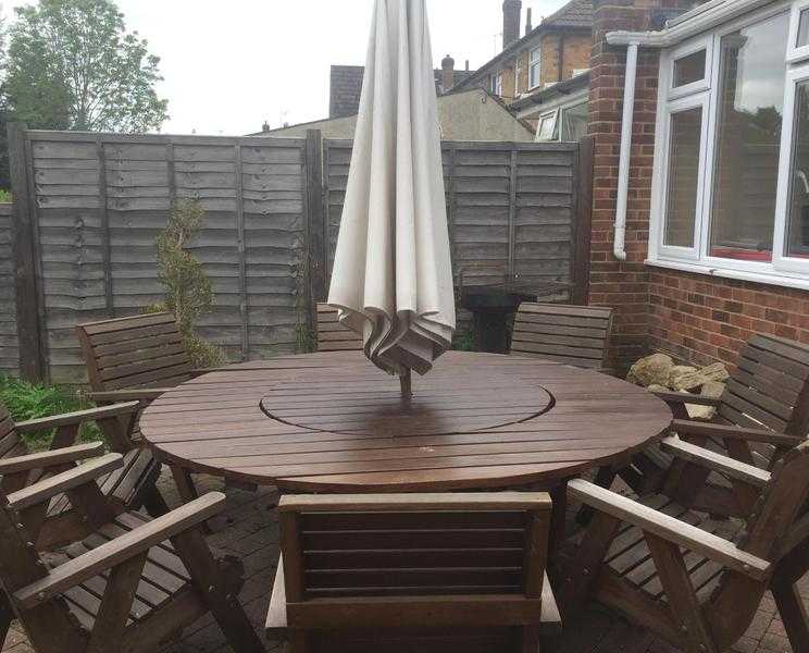 Large 8 seater wooden table and chairs