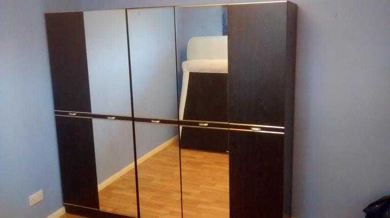 LARGE BLACK AND MIRROR039S WARDROBE in Good condition.