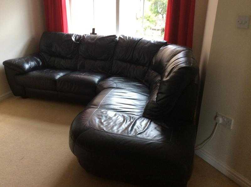 Large black leather corner sofa