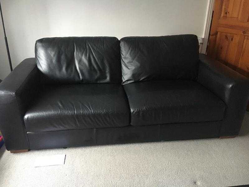 Large black leather sofa