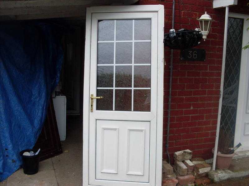 large bundle of upvc doors and 1 composit door nearly brand new