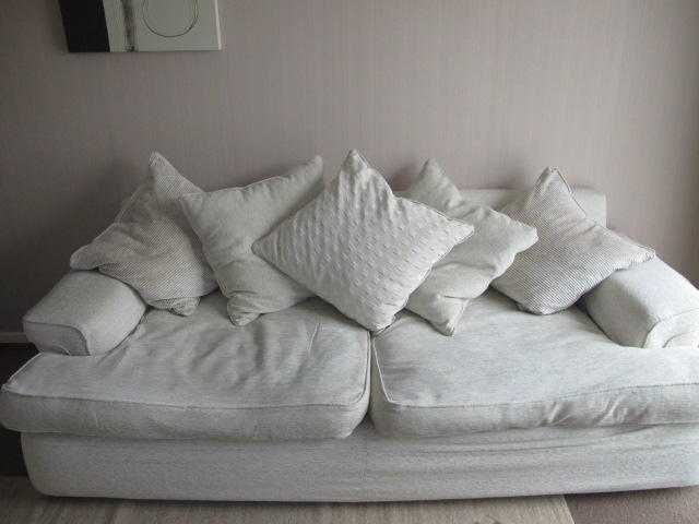 Large cream DFS fabric Sofas x3 seater  230cm105cm76. x2 seater 204cm10576