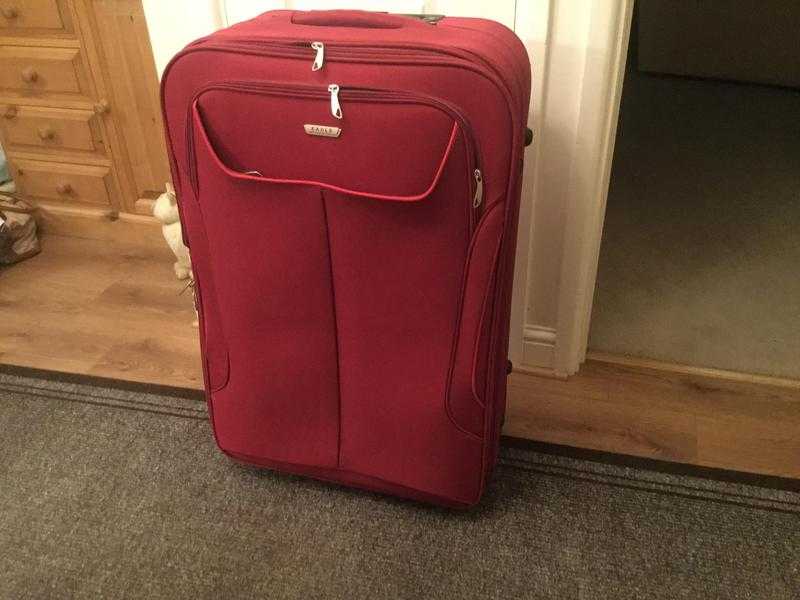 Large expanding suitcase with wheels.