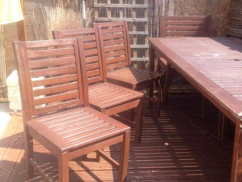 Large hardwood table and 8 chairs