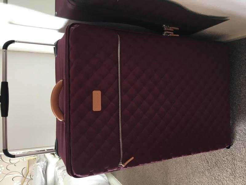 Large lightweight suitcase. Never used.
