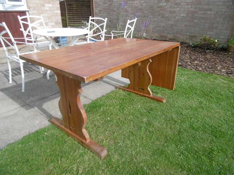 LARGE PINE DINNING TABLE FOR SALE.