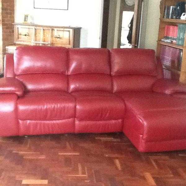 Large red leather sofa