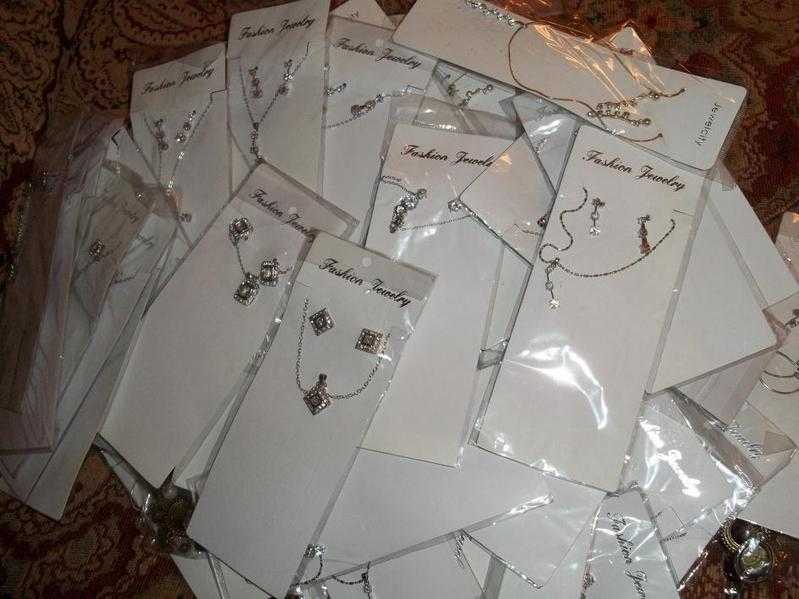 Large selection of necklace and earring sets all brand new