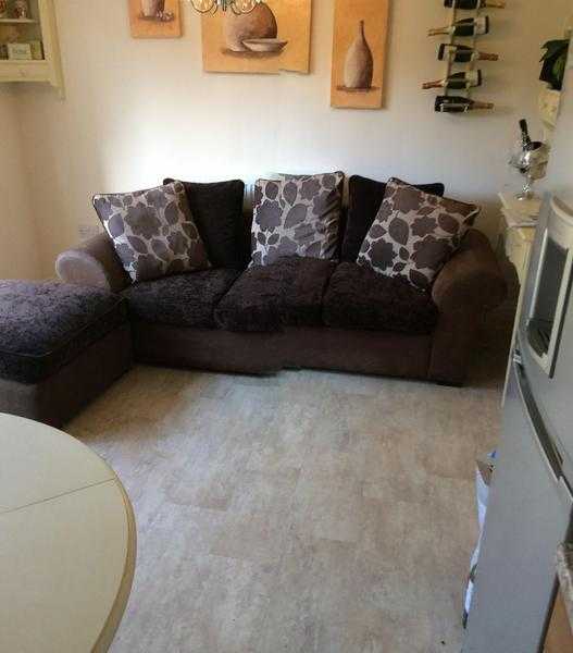 Large sofa and footstall