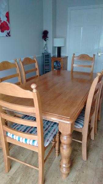 Large solid wood dining table and chairs