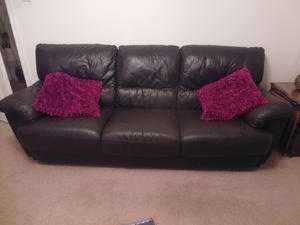 Large three seater faux leather sofa in chocolate brown