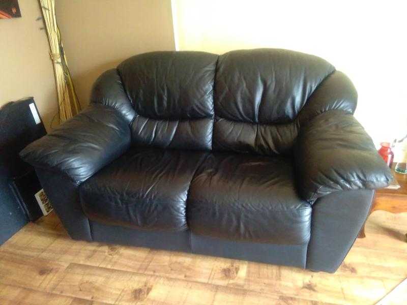 Leather black sofa. 2 seater and 3 seated for 600. In very good condition.