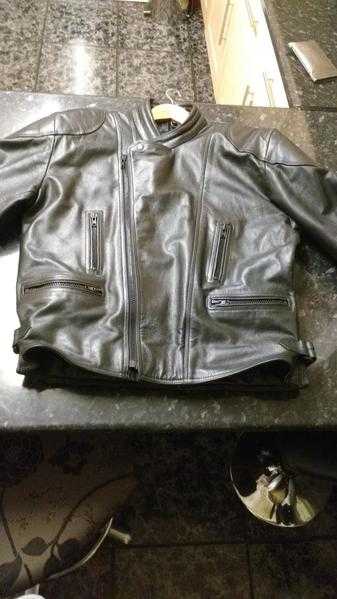 Leather motorcycle jacket in good condition.
