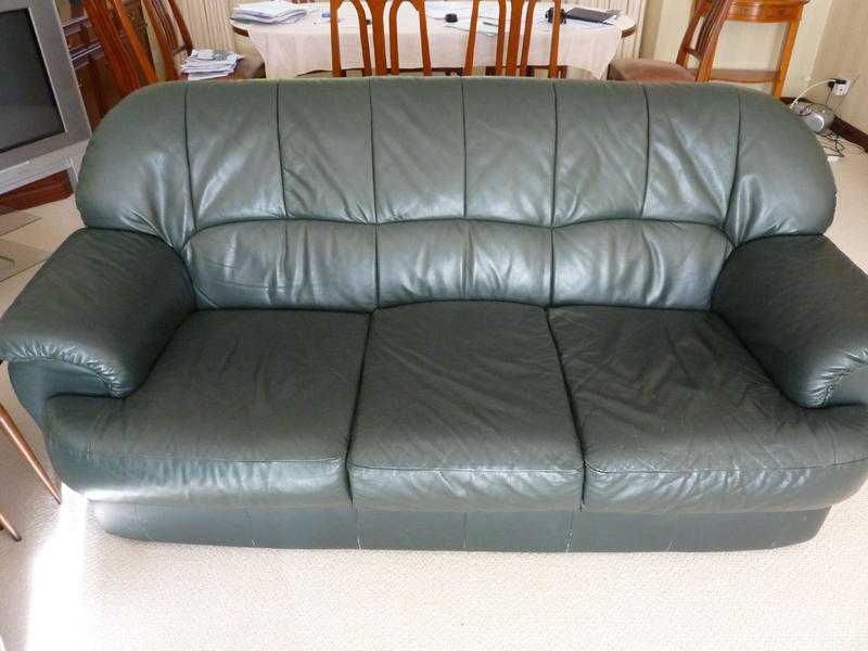 Leather sofa. 3 seater plus 3 single chairs. Dark green.