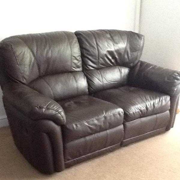 Leather sofa dark brown, with footrests.