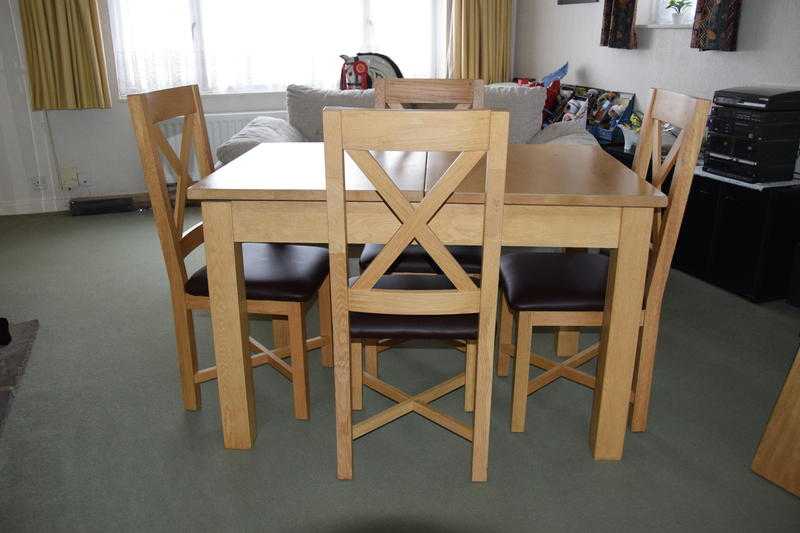Light oak dining table and 4 chairs
