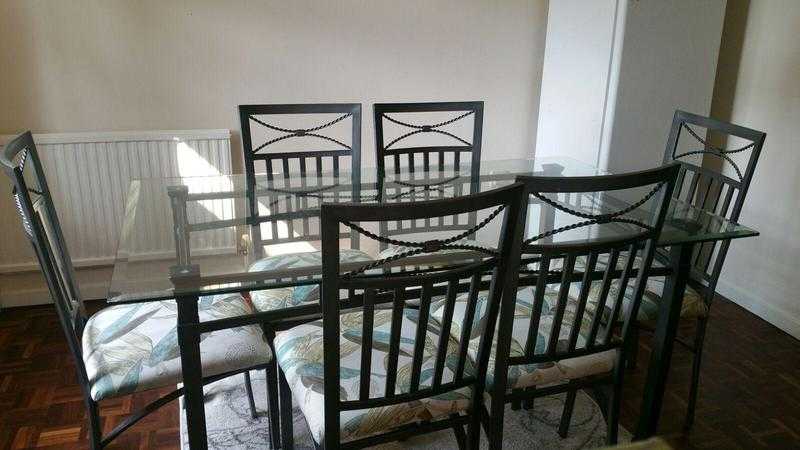 Lovely Glass Dining Table for Sale with 6 Chairs