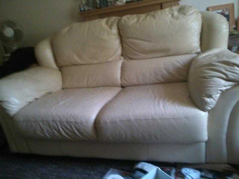 Lovely Large italian LEATHER SOFA been looked after. Cream colour. High backed, cumfy body amp arms.