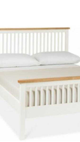 Lovely white wooden king size bed frame