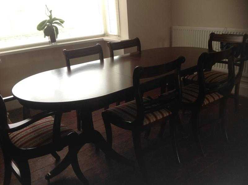 Mahogany dining table six chairs and matching sideboard