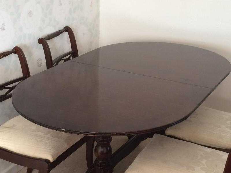 Mahogany extendable dining table and four chairs