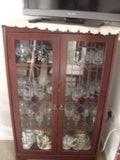 Mahogany tall slimline glass fronted display unit