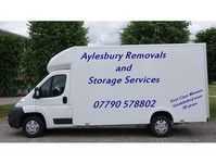 Man and a large Luton van with tail lift